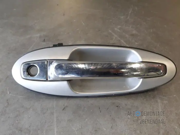 Front door handle 4-door, right Kia Magentis